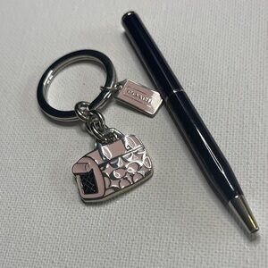 Coach Pink and Silver Bag Charm Keychain and a Coach Pen